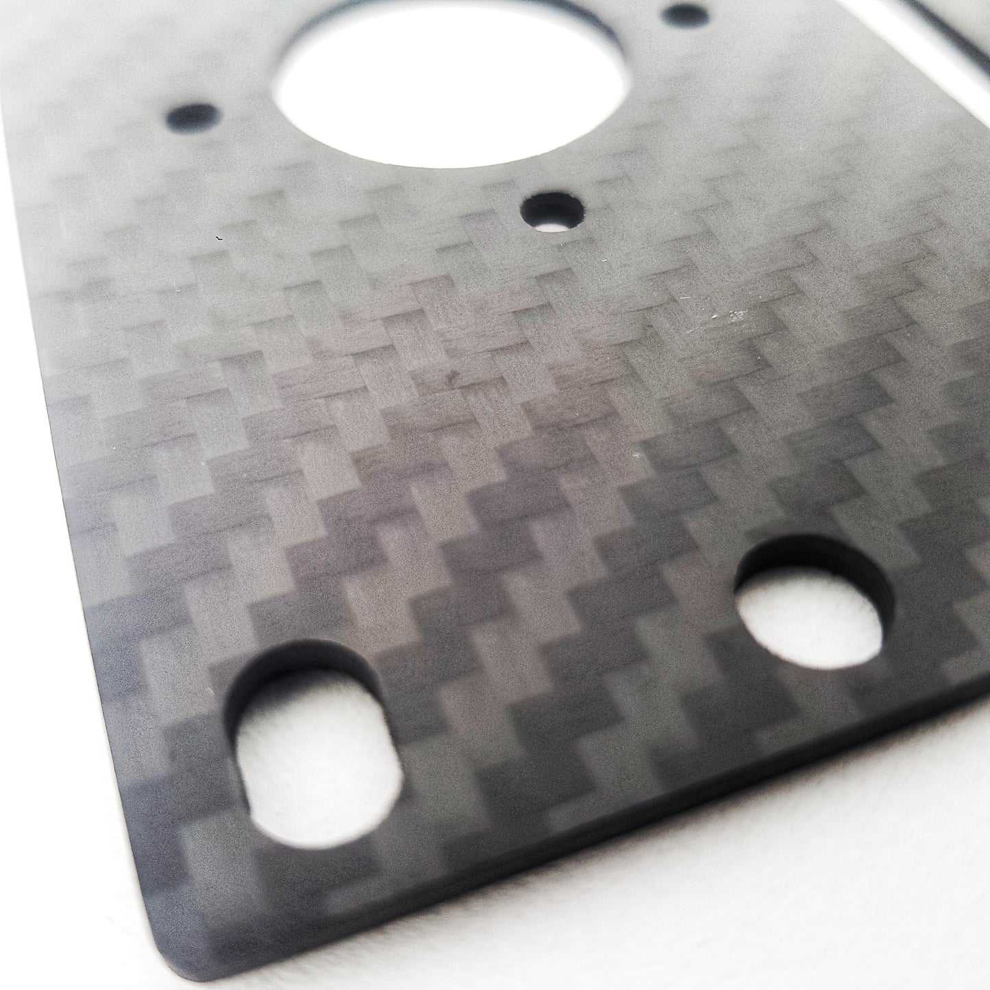 Murakumo Arts carbon fibre mounting plate for JLX