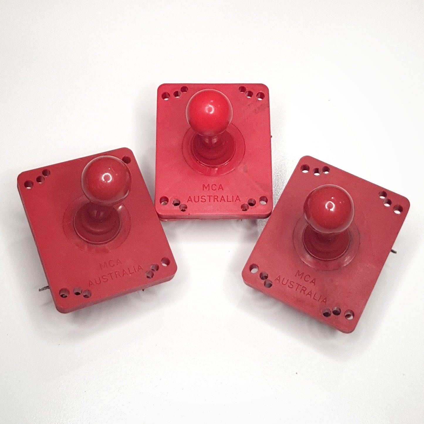 Vintage joysticks, assorted buttons and various parts