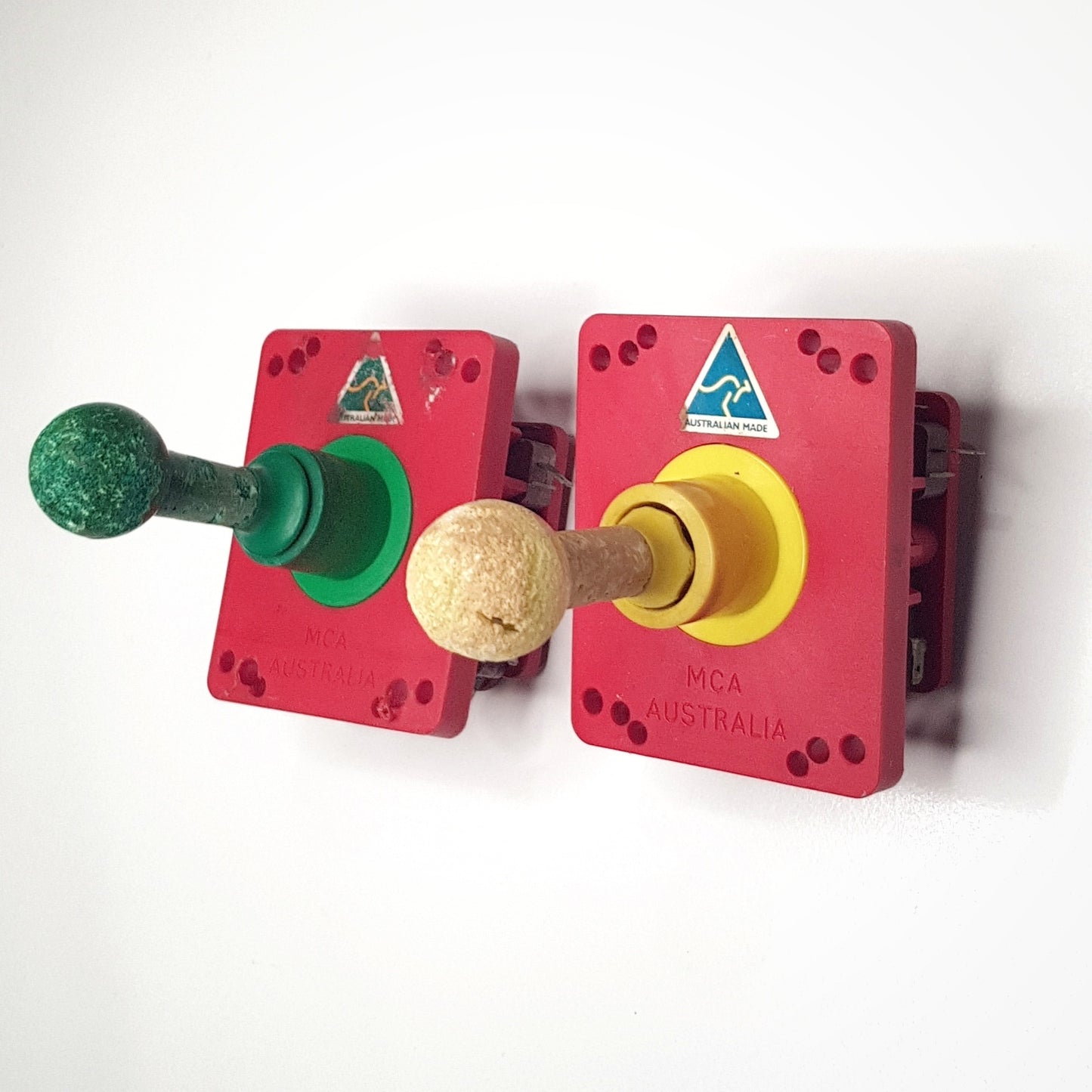 Vintage joysticks, assorted buttons and various parts